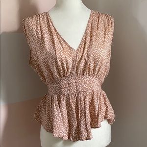 Soft pink and white top, with singed waist